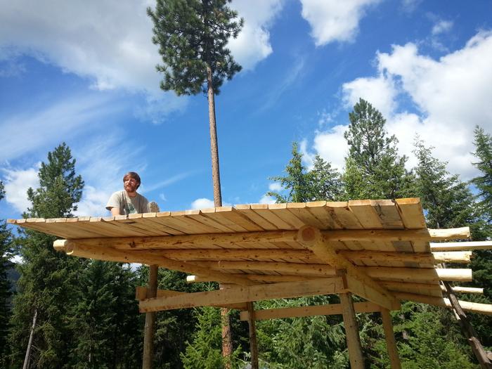 Gabe chilling on the nearly completed roof
