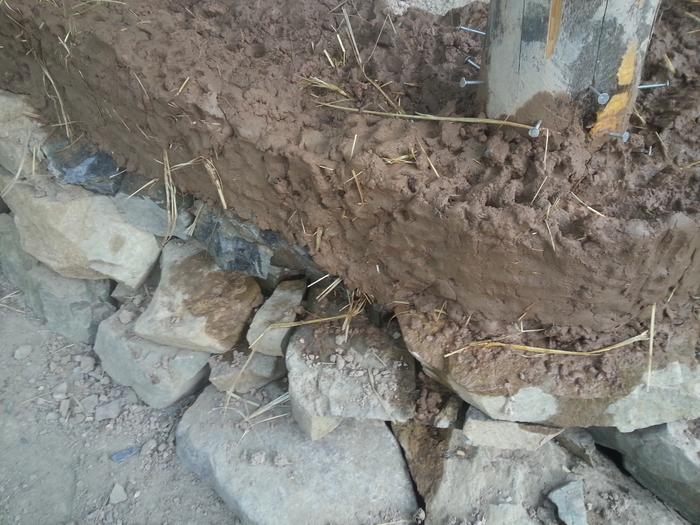 cob wall on stone foundation