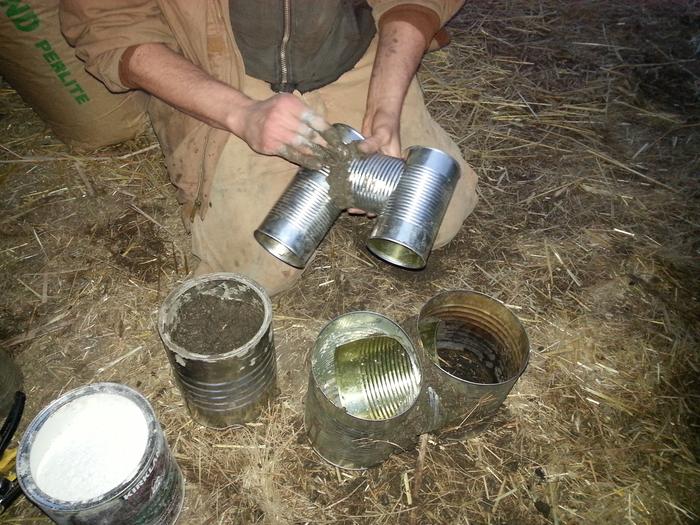 me cobbing the joints of the j-tube rocket stove