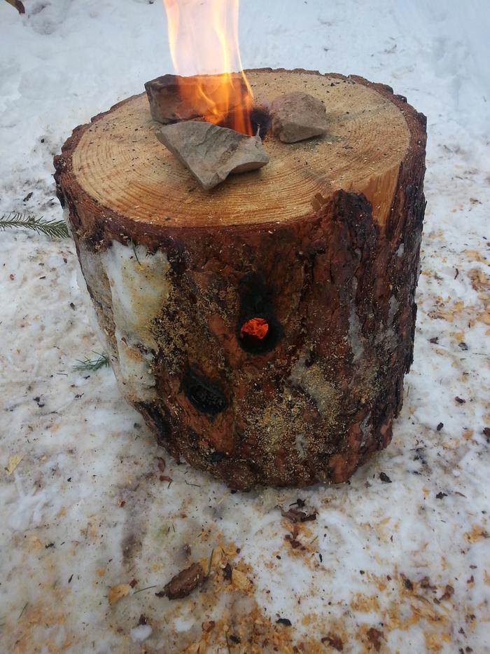 wooden rocket stove ready for cooking