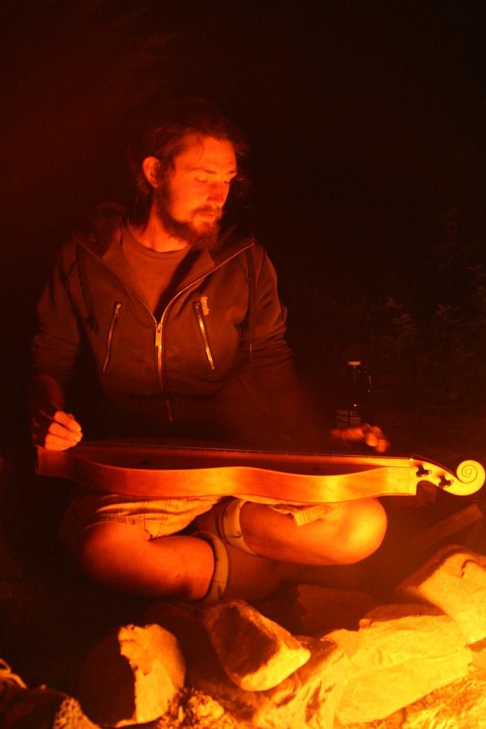 Evan playing his dulcimer