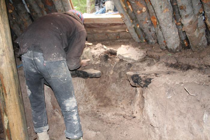 rumford fireplace inside dug out debris shelter