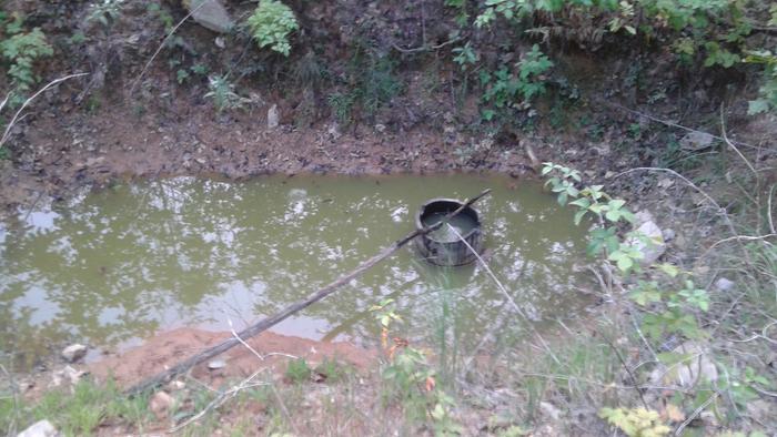 water in a big hole
