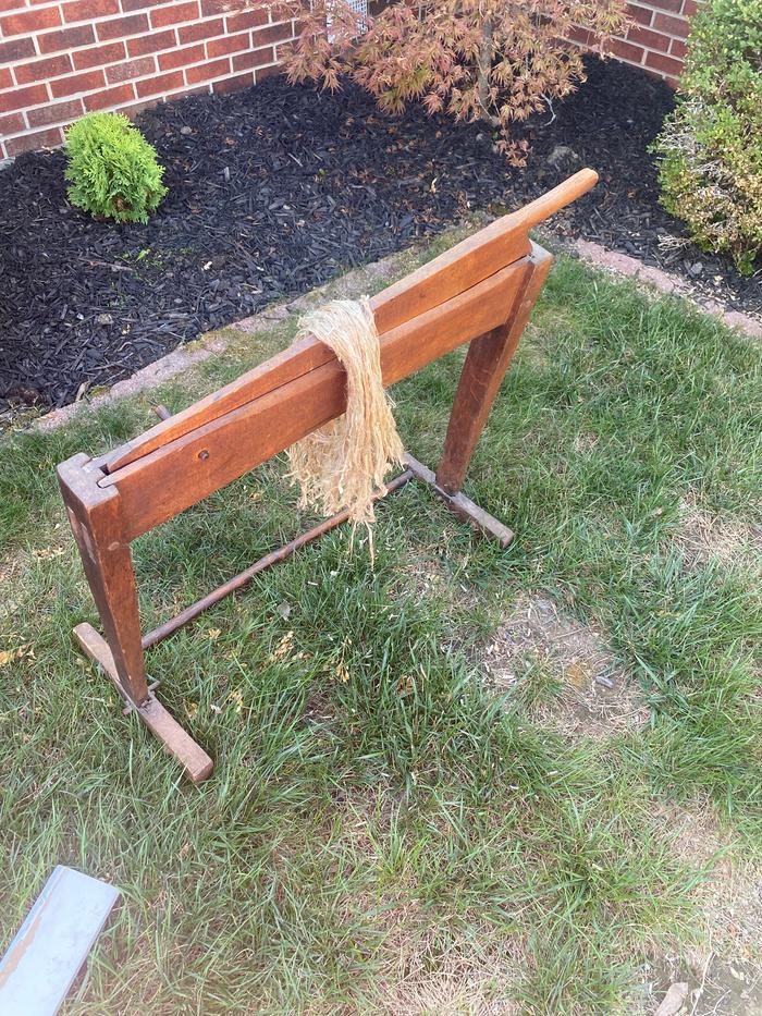 Using my antique flax brake to brake the nettle stalks. The brake worked surprisingly well causing no obvious breaks in the fibers