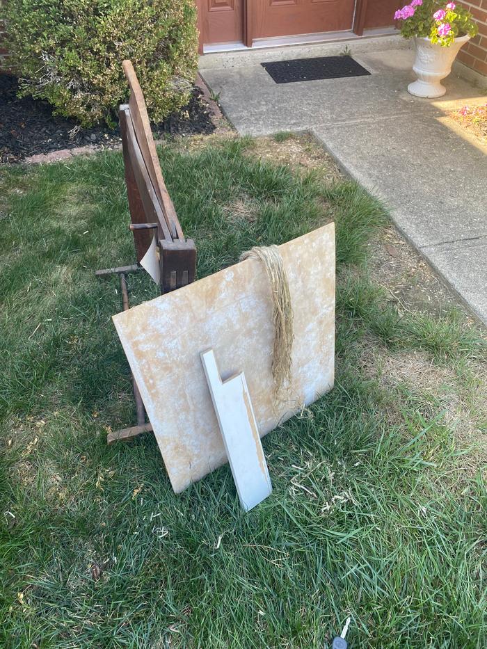 Scutching knives are hard to come by, so I made one from a leftover piece of masonite trim.