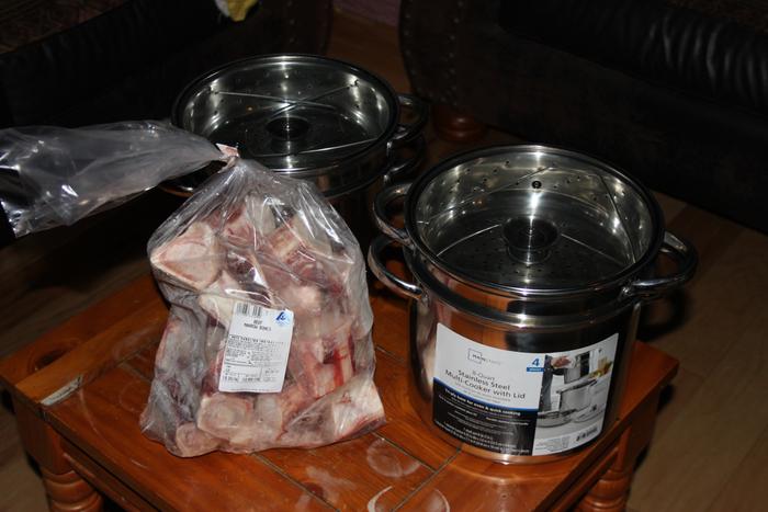 8 qt stainless steel stock pots, with steamer inserts, 10 lbs. of raw beef bones