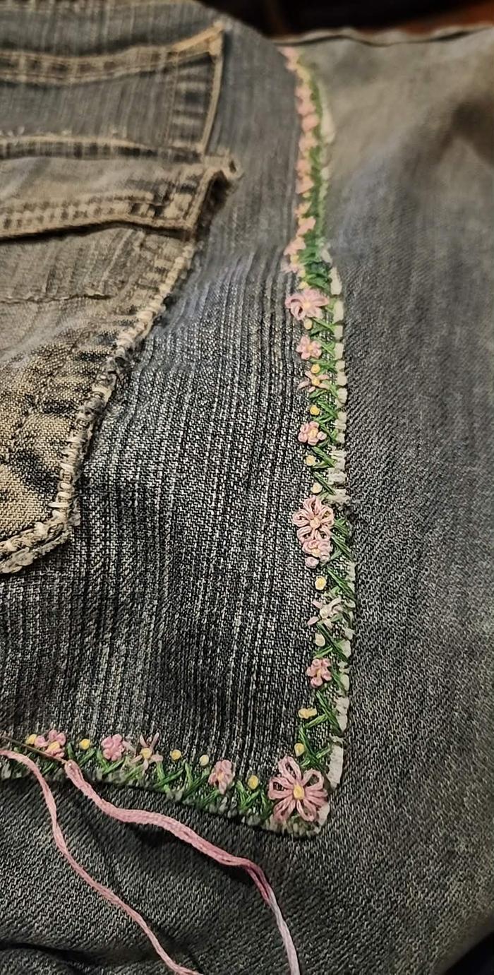 Embroidery after basting stitches we're removed, embroidery still in progress. 