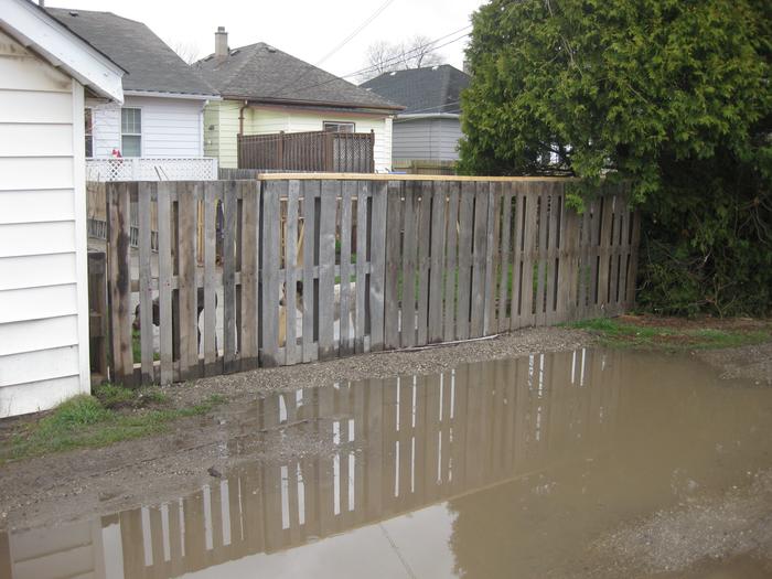 pallet fence from alley view