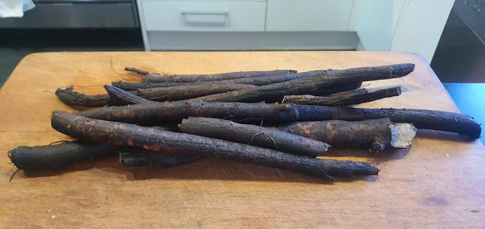 scrubbed comfrey roots ready to slice and dehydrate 