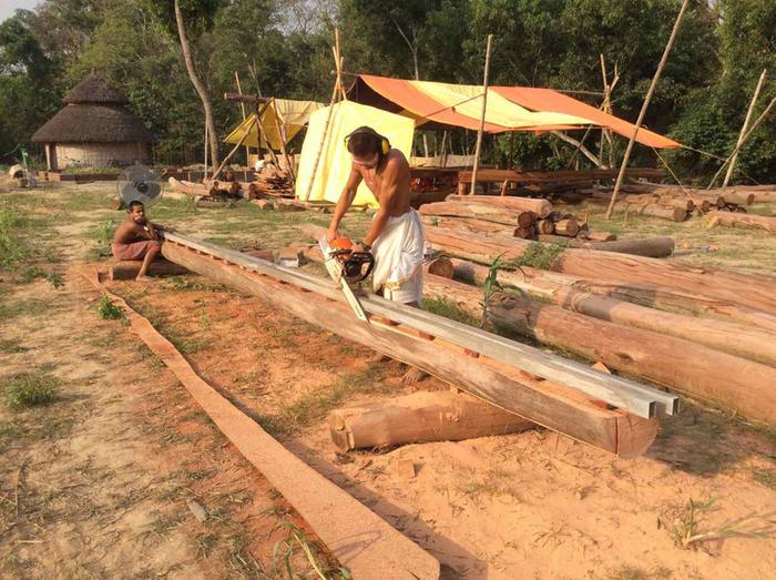 My son, Sudama, milling a long log