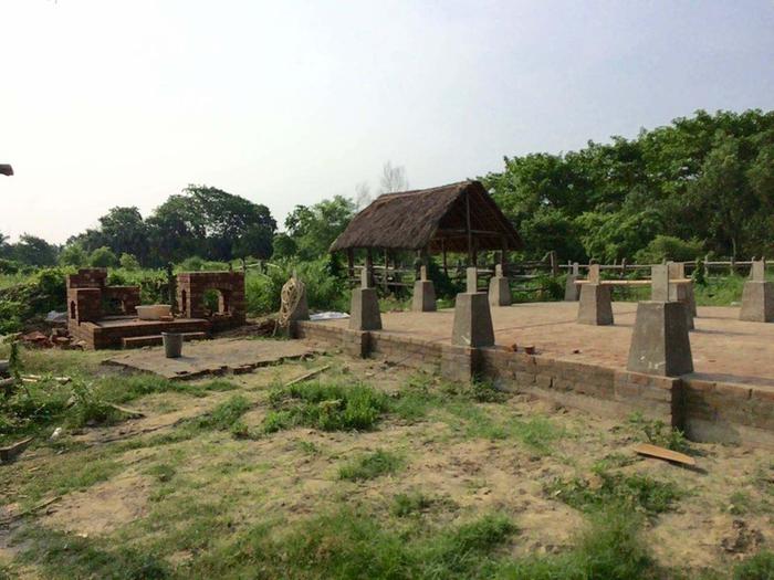 The finished foundation, on the left our hand pump facilitated laundry area.