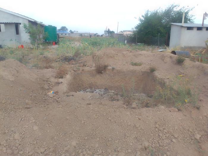 gap opened up in berm to allow water flow in