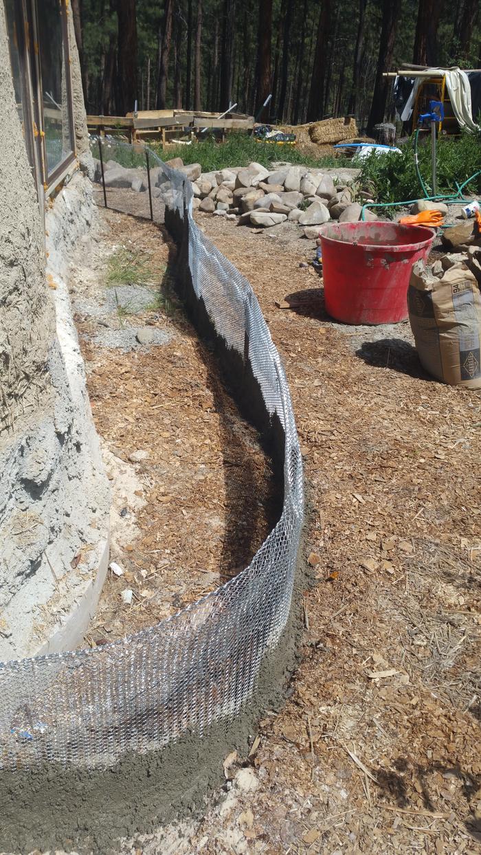 coating sides of metal lath with portland