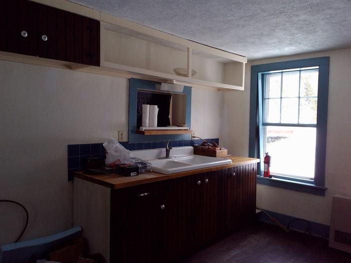 kitchen with pass thru window to dining area