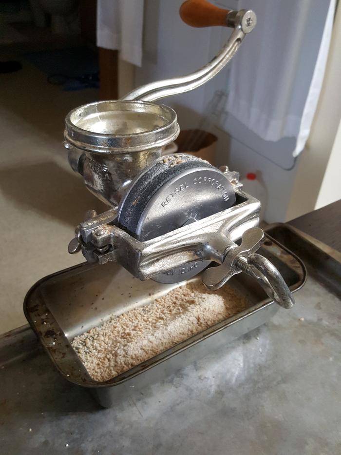 grinding whole wheat flour with a Corona grain mill