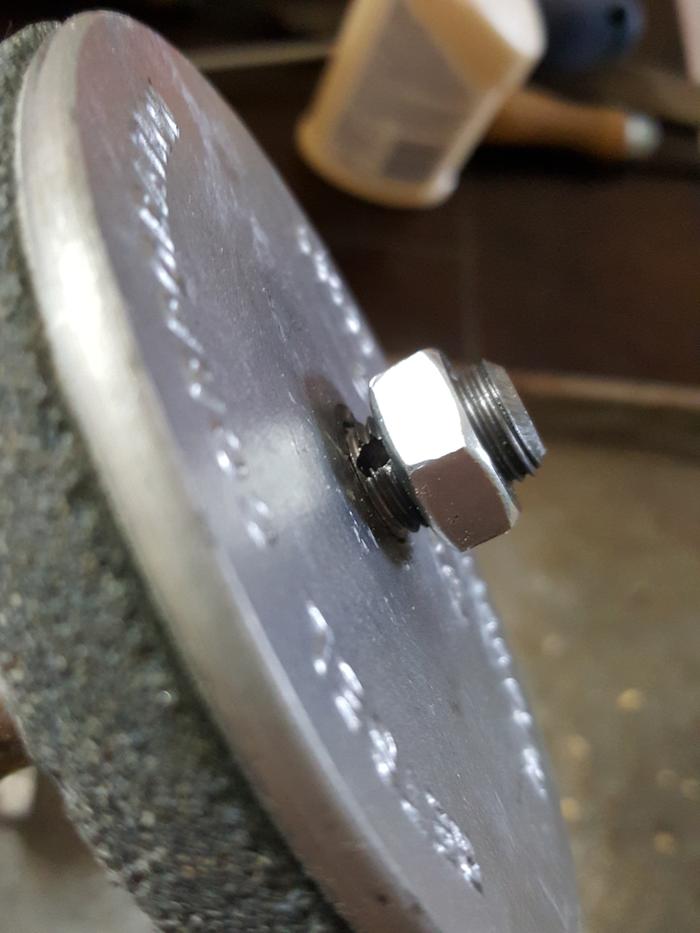 close-up of grain mill grinding plate