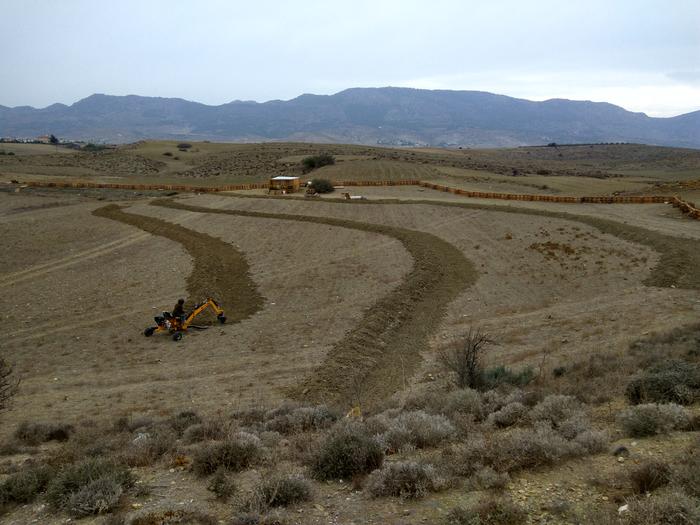 digging swales across a slope