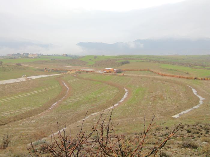 swales catching rainwater on a slope