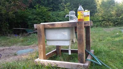 outdoor laundry sink made from pallets