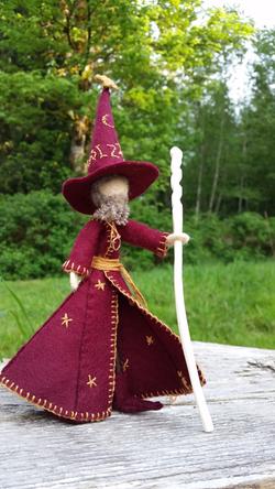 Handmade rincewind figure holding white staff