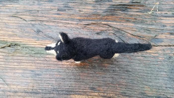 Black and tan needle felted dog from above