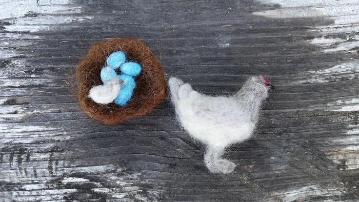 wool figurines of an araucana chicken and her nest, including blue eggs and araucana chick