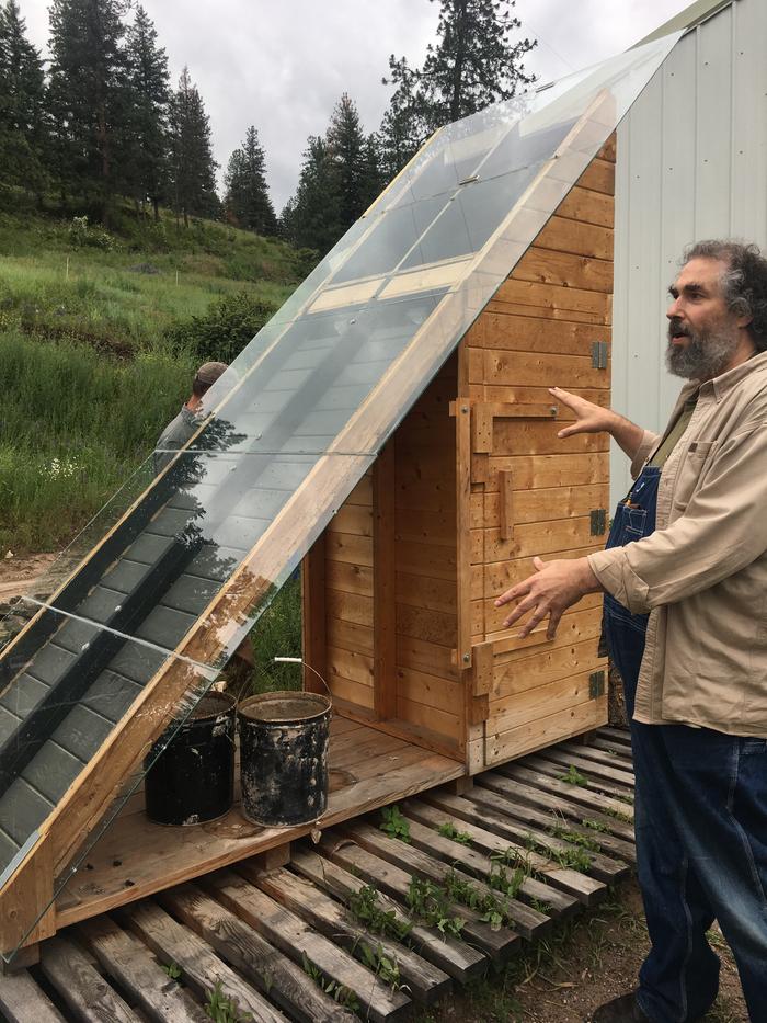 [Thumbnail for Paul-describing-the-solar-dehydrator-during-the-tour-of-basecamp..jpg]