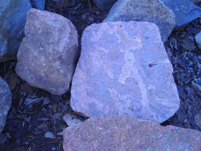 Vibrant inside of split granite boulder 32 wide