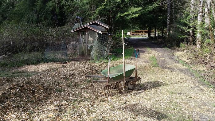 The pile had extended 2/3rds of the way into my driveway. I moved it all with the pitchfork and wheelbarrow.