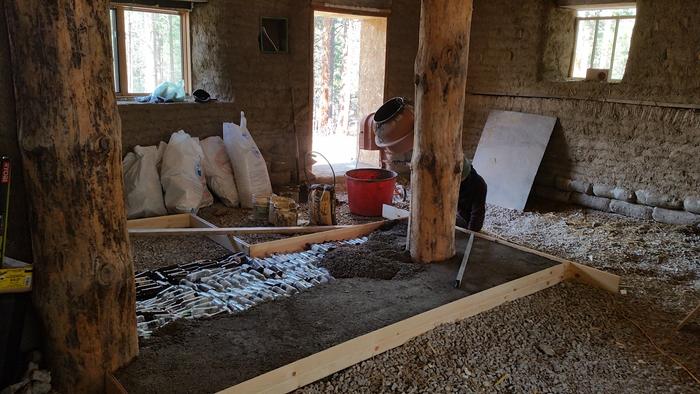 perlite cement going in as pad for bench and stove