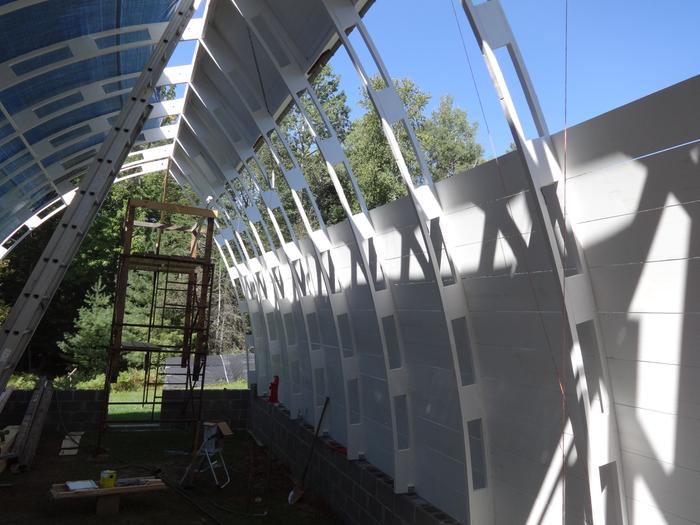 Putting North siding on which is outside the structure while the side wall structure is behind the siding. Yes that makes the corners really hard to detail