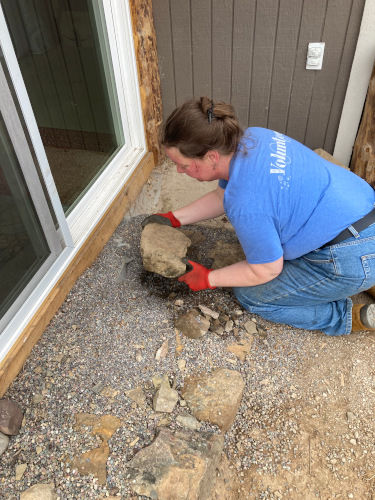 placing stones to extend the cement entry