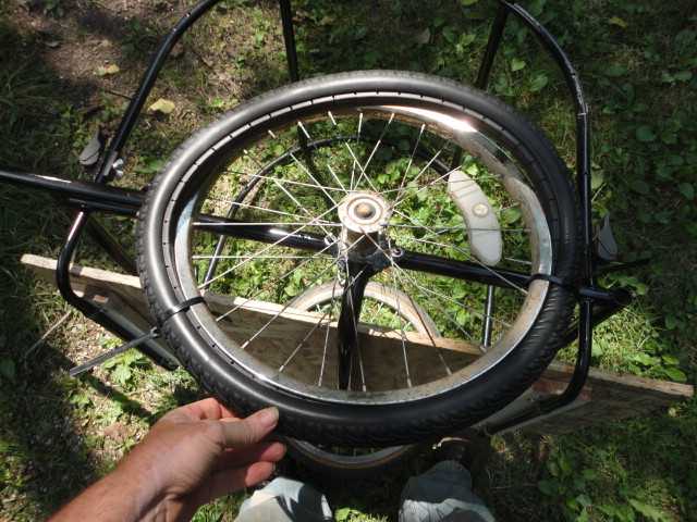 Putting on a solid rubber tire is a bit different. First anchoring it with reusable zip strips.