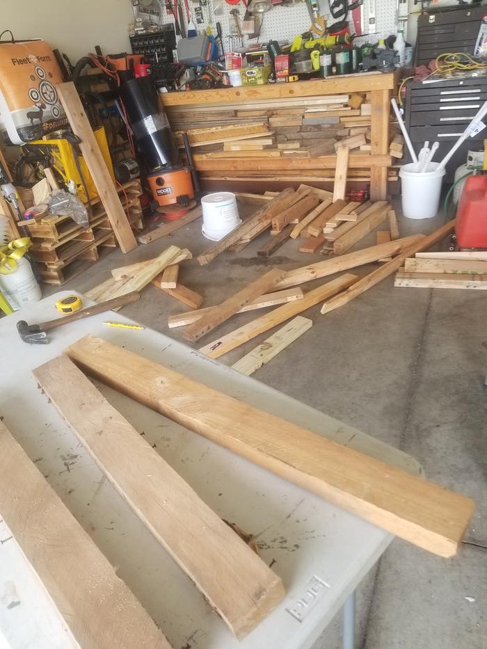 some of the wood being dug out of its storage space