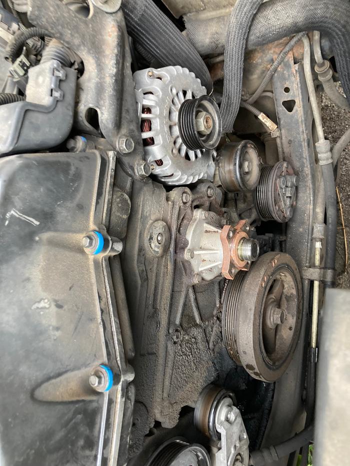 The fan, belt, and pulley are removed