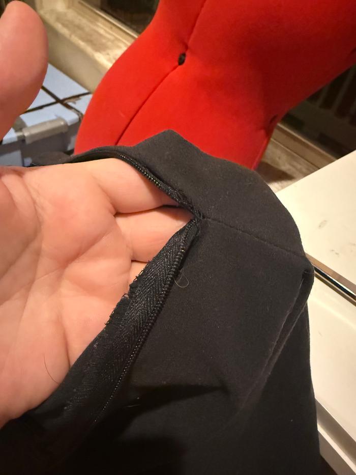 Broken zipper. The pull had come off and was beyond a simple repair.