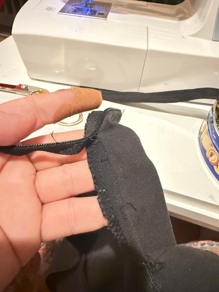 I used a thread picker to remove the old zipper.