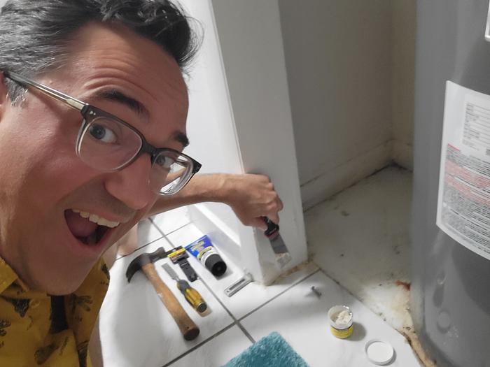 Applying wood filler. I should probably watch what I'm doing