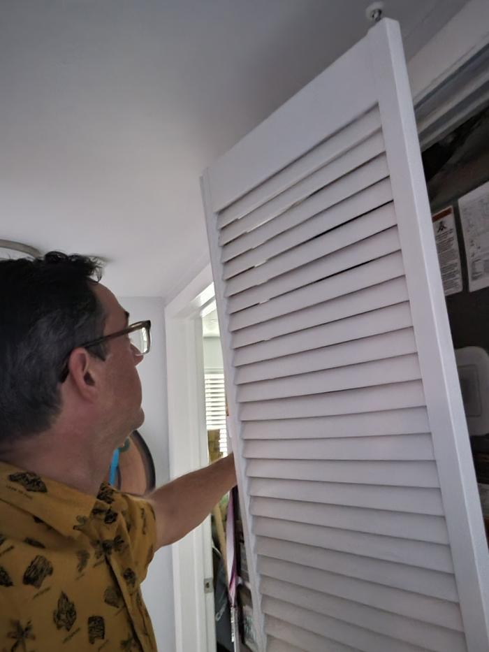 Setting the door back in the track and the thingy