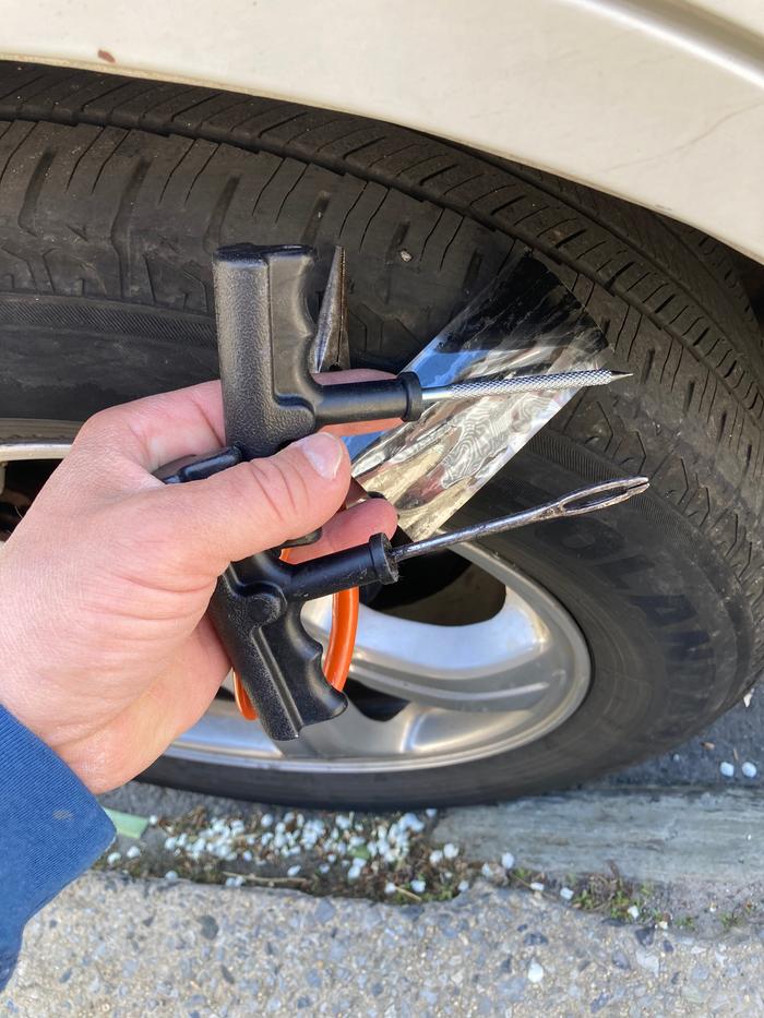 The nail in the tire. Also the supplies and tools I used.