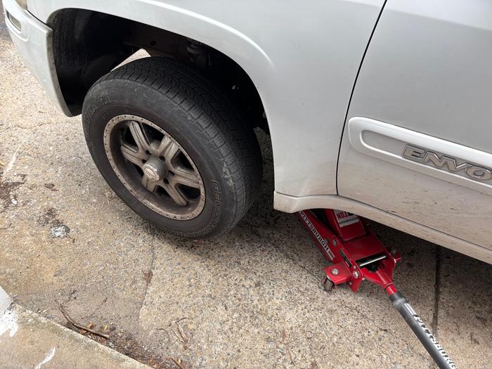 Jacking up the front driver side wheel