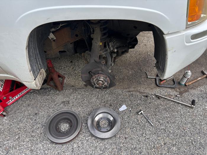 Old rotor removed on the front passenger side