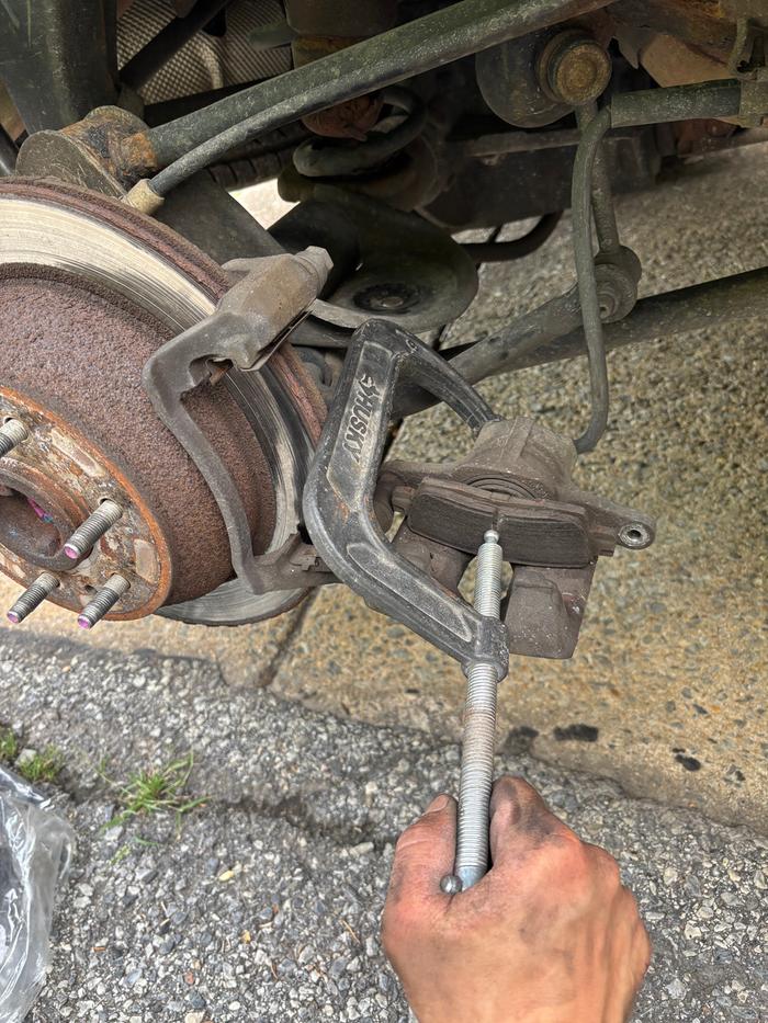 Prepping caliper for pads before removing