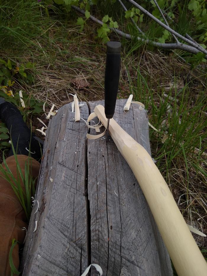 shaping wooden spoon