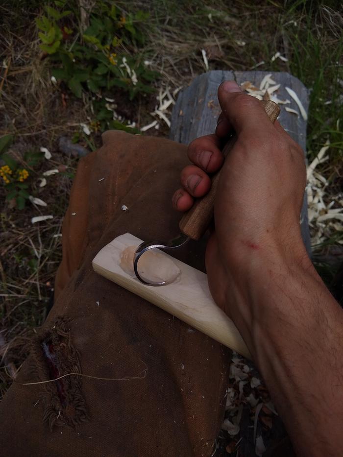 shaping wooden spoon