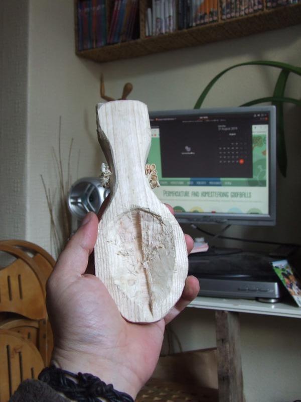 shaping wooden spoon