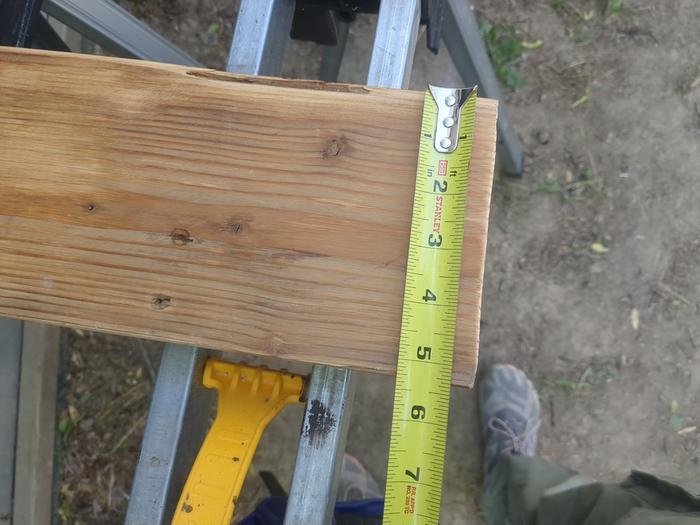5.5 inches tall. Because a 2x6 is actually 1.5" by 5.5" for some reason.