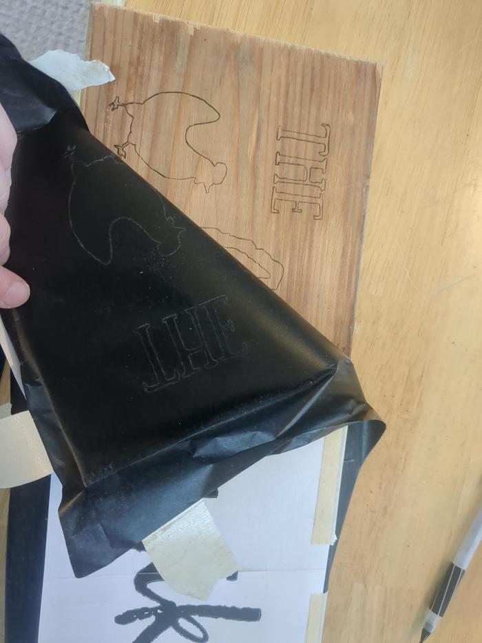 Peeling off the carbon paper. That's pretty cool.
