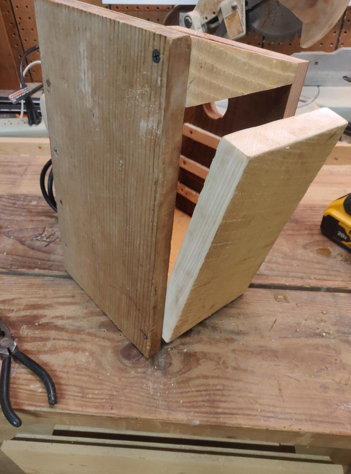 Bird house under construction hinging side