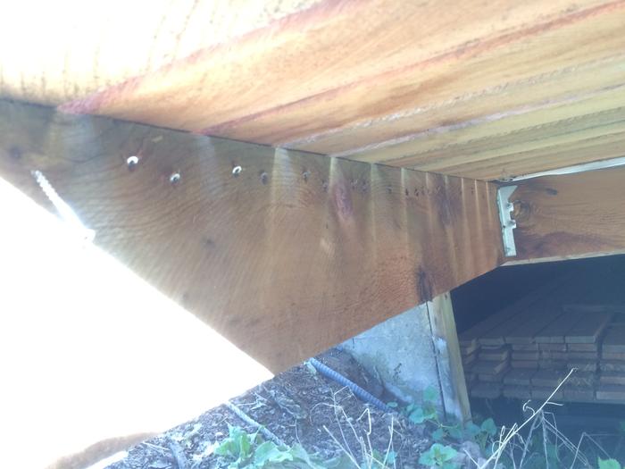 Underneath view of the screws going into the decking boards